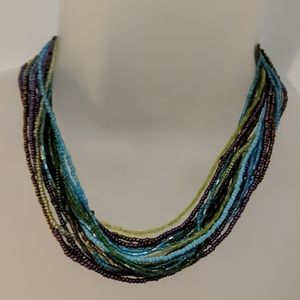 Multi strand purple blue green beaded necklace